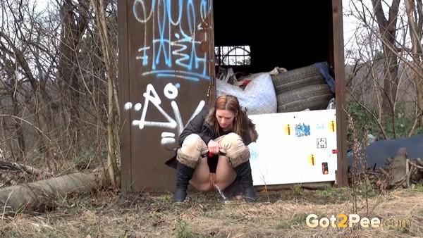 She pees near the train line (1080p)